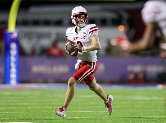 Carthage QB Jett Surratt surveys the field during the 2023 fall season.